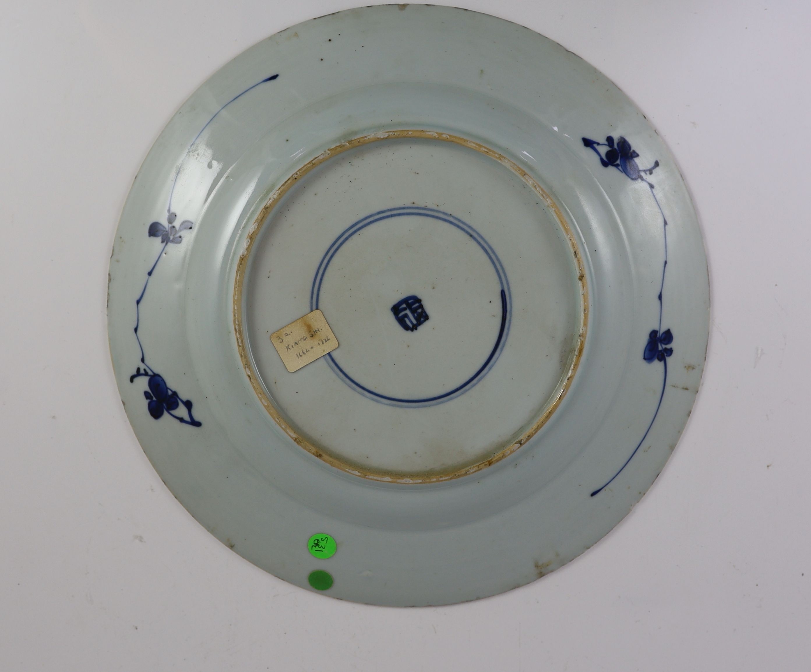 A set of three Chinese blue and white ‘pheasant’ large plates, Kangxi period, 28cm diameter, one repaired